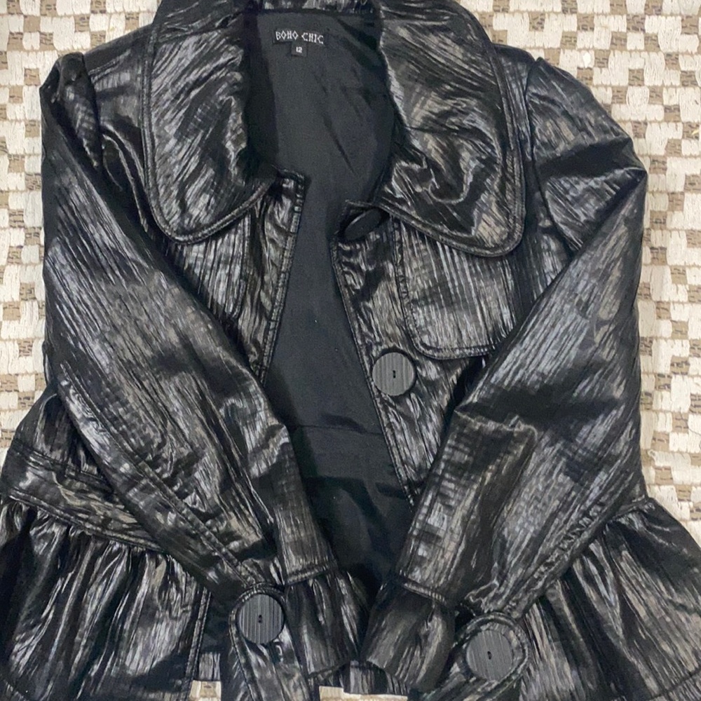 A black shear, warm, stylish coat. By Boho Chic.